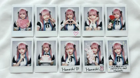 { "type": "collection of instant photos", "setting": "laid out flat on a white fabric surface", "character": { "hair": "{argument name=\"hair color\" default=\"long pink hair with blue inner color\"}", "outfit": "{argument name=\"outfit\" default=\"black and white maid uniform with frilly headband and black ribbons\"}", "eyes": "reddish-pink" }, "layout": { "arrangement": "two rows of five polaroid photos", "count": 10, "photos": [ { "position": "top row 1", "description": "holding a pink heart cushion" }, { "position": "top row 2", "description": "winking, making a peace sign" }, { "position": "top row 3", "description": "making a hand heart, pink heart doodle on the bottom border" }, { "position": "top row 4", "description": "resting chin on hands, gentle smile" }, { "position": "top row 5", "description": "holding a red rose, winking" }, { "position": "bottom row 1", "description": "finger to lips, shy expression" }, { "position": "bottom row 2", "description": "holding a small pink cake" }, { "position": "bottom row 3", "description": "winking, hand near face, signature '{argument name=\"signature text\" default=\"Hanashi\"}' and heart doodle on border" }, { "position": "bottom row 4", "description": "holding a pink bunny plushie, sparkle doodles, signature '{argument name=\"signature text\" default=\"Hanashi\"}' and bunny doodle on border" }, { "position": "bottom row 5", "description": "winking, sparkle doodles, message '{argument name=\"message text\" default=\"いつも応援ありがとう！これからもよろしくね♪\"}' and signature '{argument name=\"signature text\" default=\"Hanashi\"}' on border" } ] } }