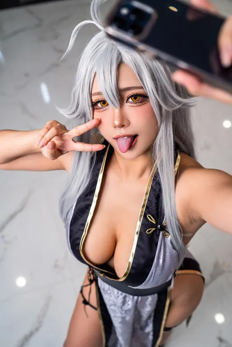 9:16 vertical aspect ratio, highly detailed, ultra-realistic Instagram Story style selfie photograph, authentic smartphone selfie texture and grain, 8k photorealistic quality.

The subject is a young beautiful East Asian adult woman cosplaying as Ghislaine Dedoldia (Sword King from Mushoku Tensei), automatically extracting the character's representative color palette and visual symbols, transforming them into elegant qipao/cheongsam patterns and accessories. She must clearly retain Ghislaine Dedoldia's most recognizable identity features: long voluminous silver-gray hair in her signature wild yet elegant style, striking golden-amber eyes, powerful athletic swordswoman build and presence, beastkin warrior aura with subtle fierce charm, along with classic color scheme, so viewers can instantly recognize her as Ghislaine Dedoldia rather than a generic cosplayer.

She stands on a light-colored, smooth indoor marble floor with subtle soft lighting reflections. Her left hand holds a smartphone, arm fully stretched upward, phone raised high above her head, shooting a high-angle selfie looking down, creating a natural high-position selfie perspective with realistic wide-angle lens distortion. The composition feels like a casual real-life phone snapshot grab, not a posed studio poster. The character dominates the frame, clearly showing her head, upper body, waist-hip curves, and part of her legs.

Her right hand is gently placed beside her face making a clear, standard "YEAH" hand gesture, while playfully sticking out her tongue — not a tiny cute poke, but a slightly longer, mischievous tongue out. Her expression is confident, charming, and playfully seductive, infused with Ghislaine's own strong, straightforward, and powerful sword king presence.

She features exquisite makeup with long lashes, sharp eyeliner, three-dimensional facial features, and naturally delicate skin with realistic human portrait texture. The hairstyle, hair color, and accessories are realistically reinterpreted from Ghislaine Dedoldia's original design while preserving strong character recognizability, presented as a high-end realistic cosplay photograph.

The outfit is a deep V-neck, high side-slit satin qipao-style dress redesigned based on Ghislaine Dedoldia's classic color scheme. The qipao's main color, secondary tones, piping, patterns, and decorative elements must derive from her iconic palette and visual motifs — primarily silver-gray and black with rich gold accents, subtle wolf or sword-inspired embroidery, and tribal energy lines. Deep plunging neckline, high slit design, body-hugging tailoring that accentuates her athletic figure, premium silk-satin lustrous sheen, with thematic patterns on the fabric such as elegant geometric motifs, sword engravings, beast/wolf symbols, or character-exclusive warrior decorations. Overall luxurious, sexy, powerful, and opulent while keeping Ghislaine's identity unmistakable.

Soft indoor lighting, ultra-realistic skin texture with natural fine details and pores, sharp clear facial features, realistic satin reflections on the clothing and subtle reflections on the marble floor. The overall look is a high-quality authentic phone selfie: exquisite, sexy, natural, with strong character fidelity, realistic portrait photography style.